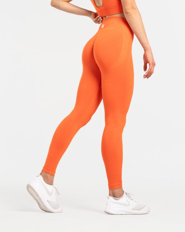 Legginsy Push Up w kolorze pomarańczowym. Modelujące pośladki.