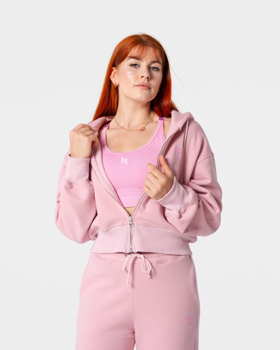 Dres damski różowy. Bluza z metalowym zamkiem. Duży kaptur, szerokie rękawy.