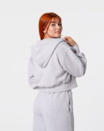 dresy damskie - szara bluza dresowa z metalowym zamkiem. jest w szarym kolorze. posiada duży kaptur.