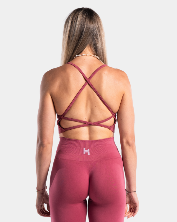 stanik sportowy różowy z odkrytymi plecami. stanik na siłownię. odkryte plecy.