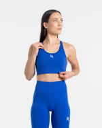 stanik sportowy w kolorze niebieskim. ma ragulowane ramiączka i bardzo dobre podtrzymanie. świetny do biegania i na siłownię.